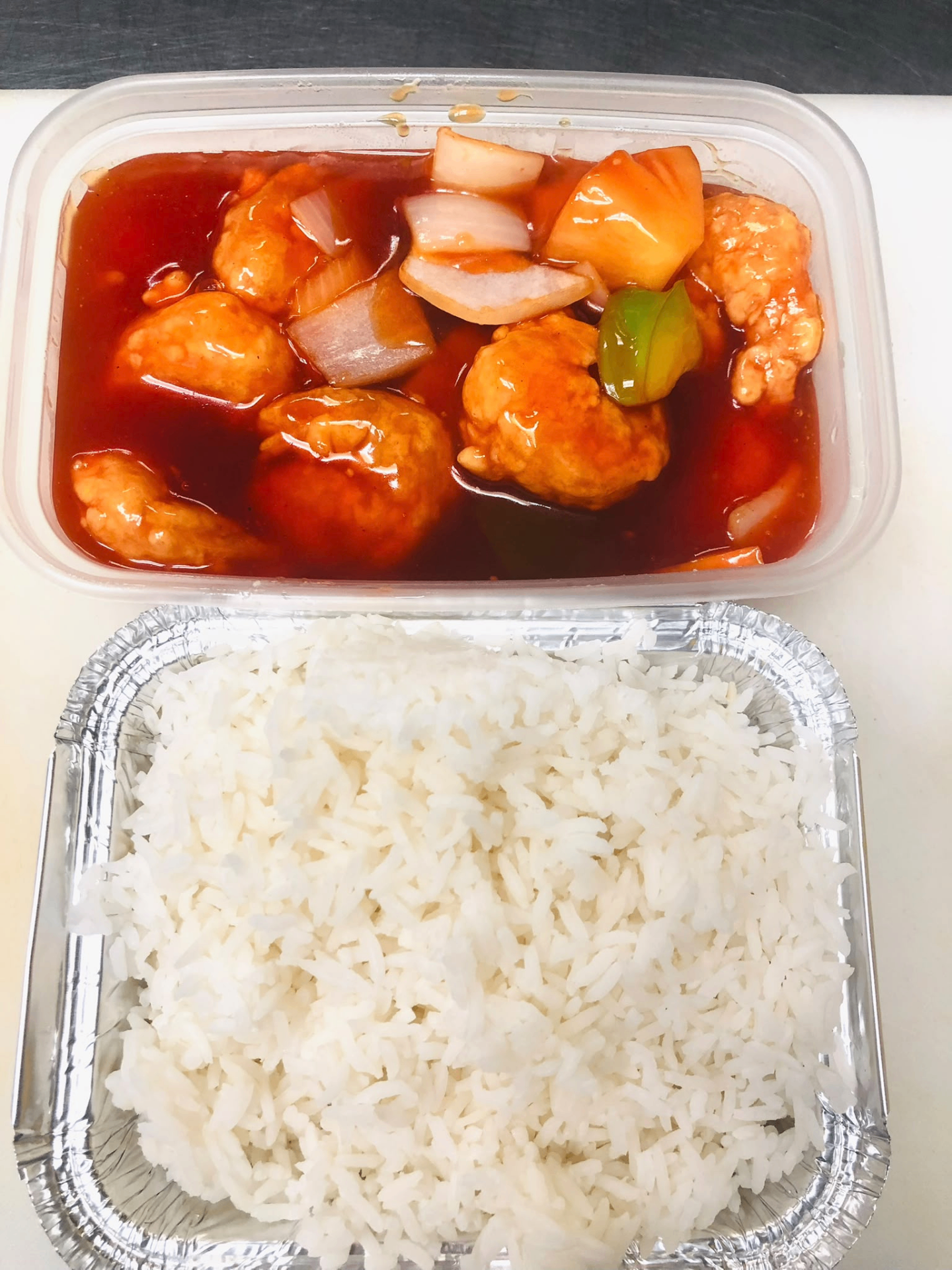 Sweet and sour chicken balls with boiled rice